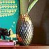 Saifon creates a vase of singular beauty, its unique form reminiscent 