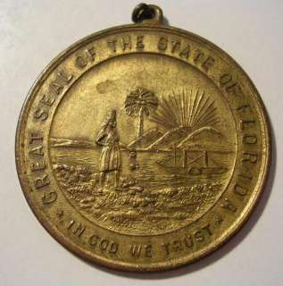 VINTAGE GREAT SEAL OF THE STATE OF FLORIDA IN GOD WE TRUST BRASS MEDAL 