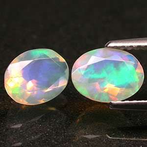 MATCHED 8x6 MM.1.50 ct.EXCELLENT NATURAL MULTI COLOR FIRE OPAL NR 