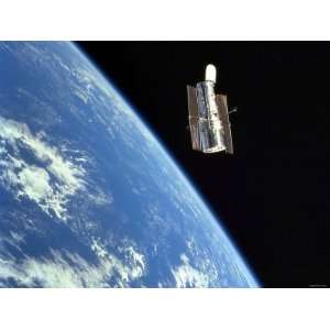  The Hubble Space Telescope with a Blue Earth in the 