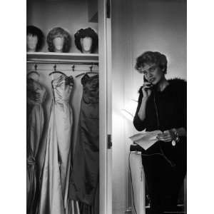  Singer Julie Wilson on Phone Beside Closet with Hanging 
