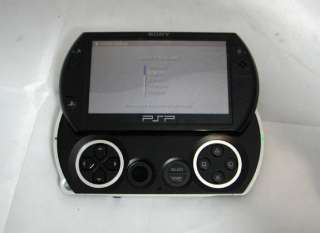 Sony PSP Go 16GB Piano Black Handheld Game System Digital Game Pack 