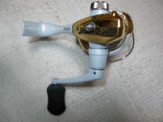 Auction includes reel, spare spool (both with fresh line), box, all 