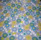 mhd scrub top M, purple with blue, yellow flowers. 2 lower pockets