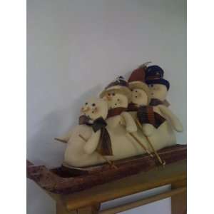  Rustic Snowman Family on a Sled