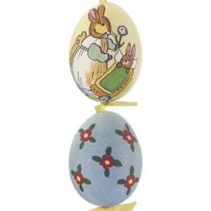   Bunny Holding Flower Egg Christmas Ornament: Home & Kitchen
