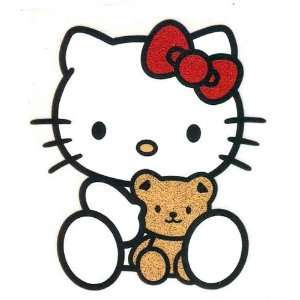 Hello Kitty wearing red bow holding teddy bear Iron On Transfer for T 