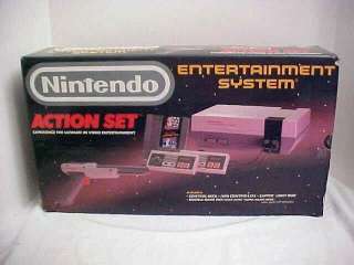 NINTENDO ACTION SET IN BOX W/PAPERS COMPLETE WITH GAME SHOWN PLAYING 