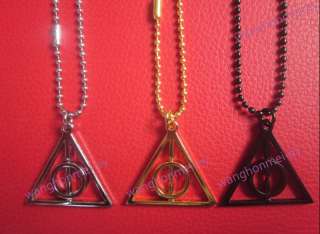 Harry Potter DEATHLY HALLOWS NECKLACE Spins Rotating Center Wizardin 
