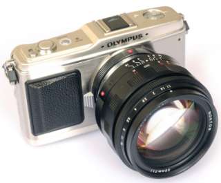 Olympus E P1 mounting Voigtlander M adapter and Voigtlander 50/1.1 and 