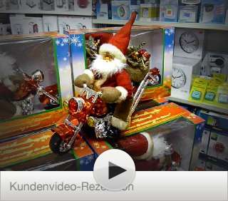 Großer singender Weihnachtsmann auf Motorrad mit Showeffekt  