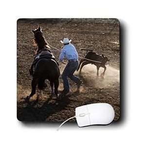   Cowboy competes at rodeo calf roping event   Mouse Pads Electronics