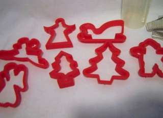 Holiday cookie cutter, measuring spoons, pie rim covers  