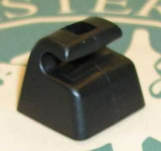 This is a Black color sunvisor clip for Jaguar cars from the 70s 
