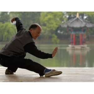 Man Doing Tai Chi Exercises at Black Dragon Pool with One 