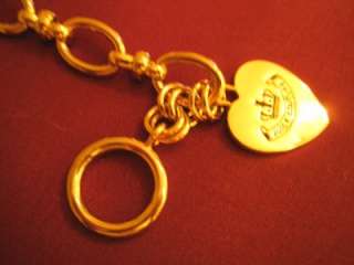 Boxed Juicy Couture gold heart charm starter bracelet