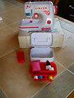 Singer toy sewing machine with box thread & instructions